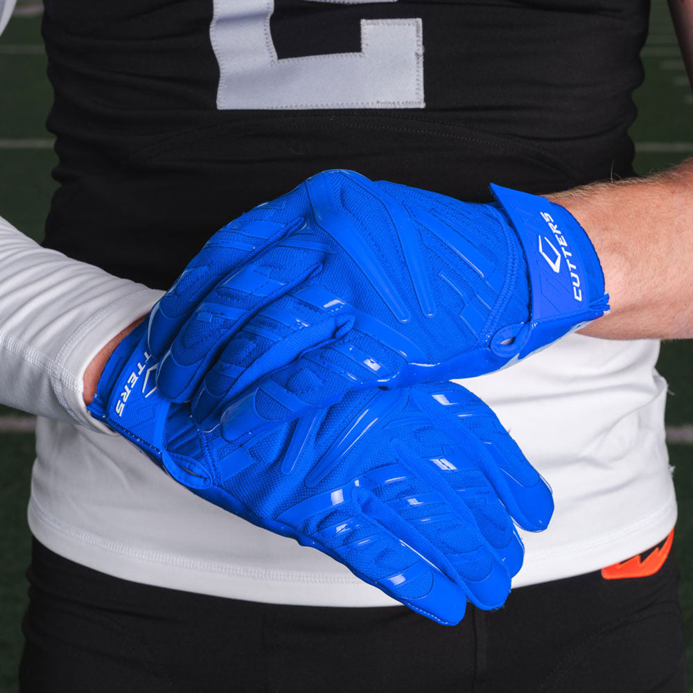 Athlete Wearing Cutters Gamer 6.0 Royal Blue Padded Receiver Gloves