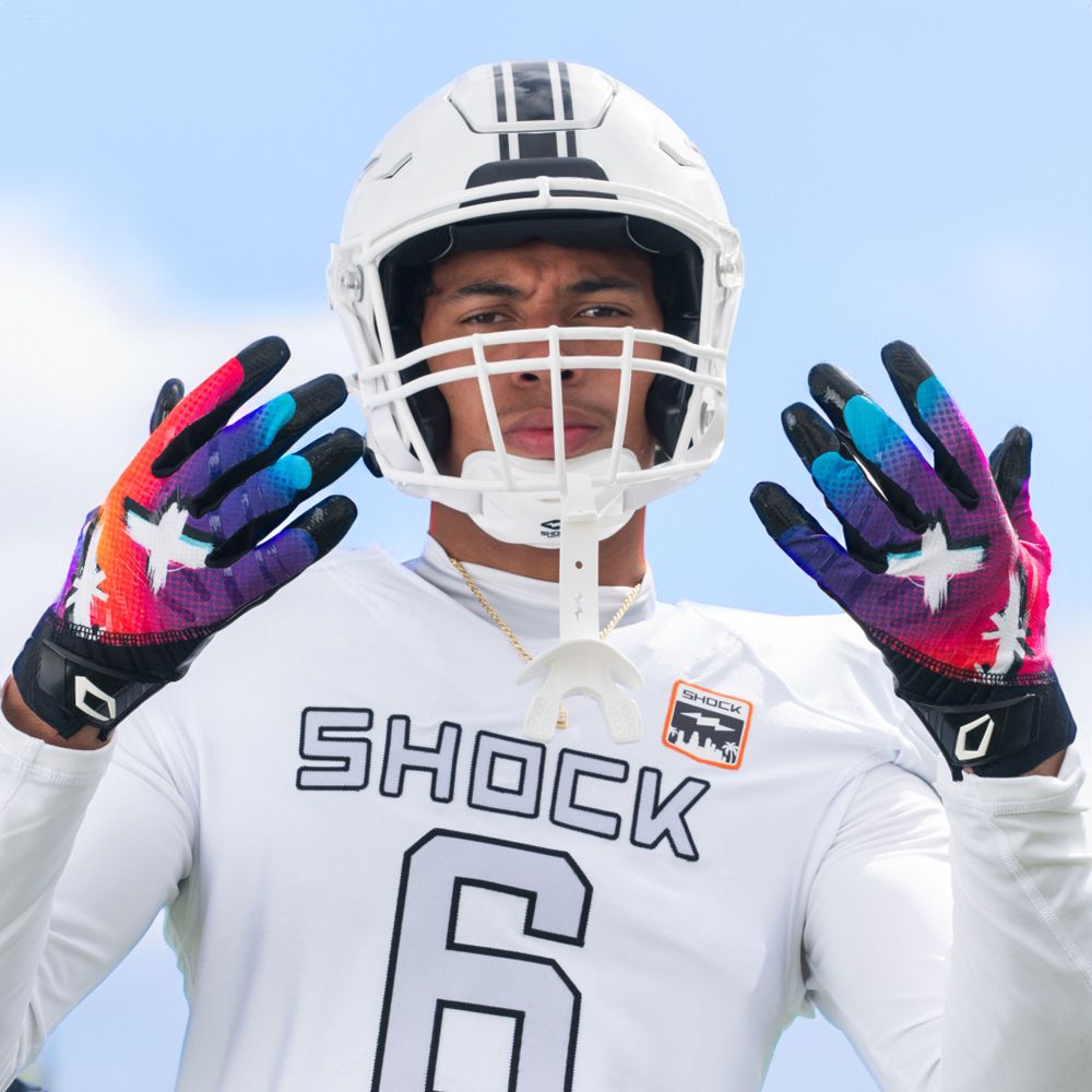 Athlete Wearing Cutters Rev Pro 6.0 Limited Edition Football Receiver Gloves in Multi Color Face Print