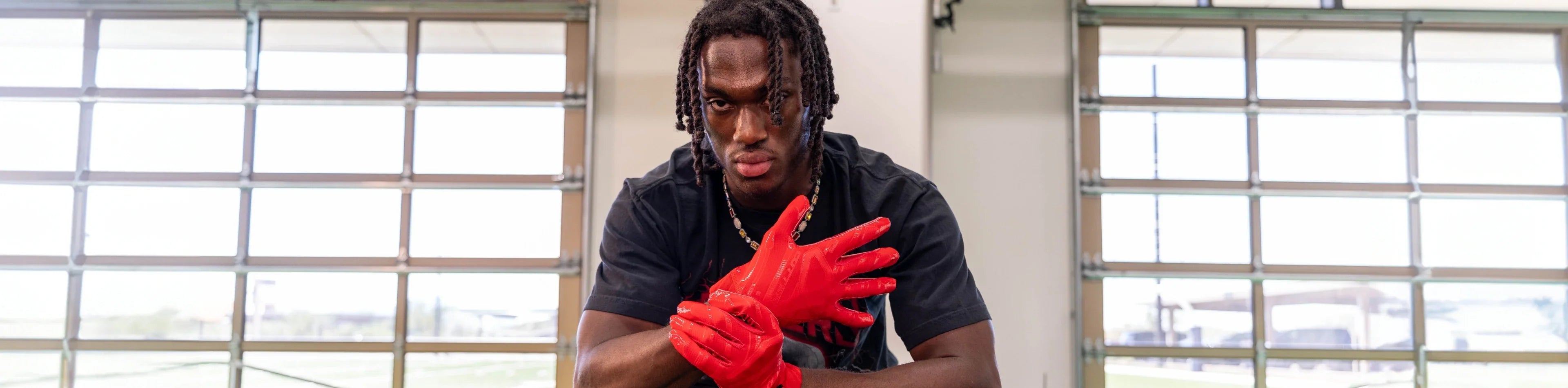 Header image for the Marvin Harrison Junior's Picks collection by Cutters Sports. NFL athlete Marvin Harrison Jr. showcases his top football gear selections, highlighting performance gloves and game-ready accessories.