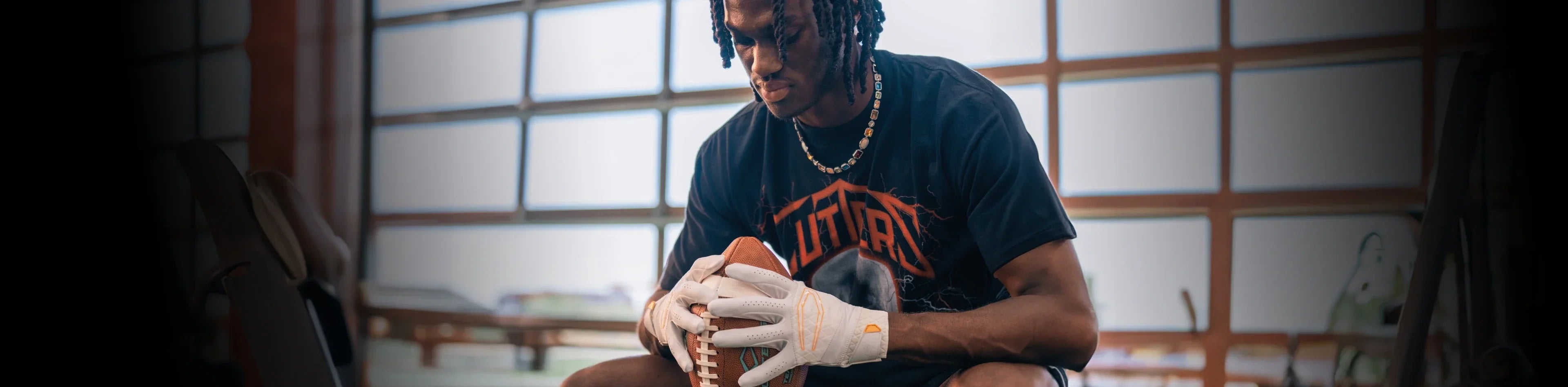 Header image for the 'Best Sellers' Collection by Cutters Sports. NFL athlete Marvin Harrison Jr. showcases one of our top football gear selections, highlighting performance gloves and game-ready accessories.