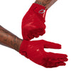 Cutters Sports Rev Pro 6.0 Solid Receiver Football Gloves - Red - Football Player Pulling Glove Over Wrist for Better Fit