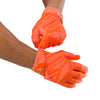 Cutters Sports Rev Pro 6.0 Solid Receiver Football Gloves - Orange - Football Player Pulling Glove Over Wrist for Better Fit