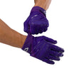 Cutters Sports Rev Pro 6.0 Solid Receiver Football Gloves - Purple - Football Player Pulling Glove Over Wrist for Better Fit