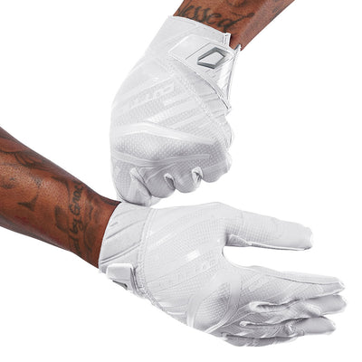 Cutters Sports Rev Pro 6.0 Solid Receiver Football Gloves - White - Football Player Pulling Glove Over Wrist for Better Fit