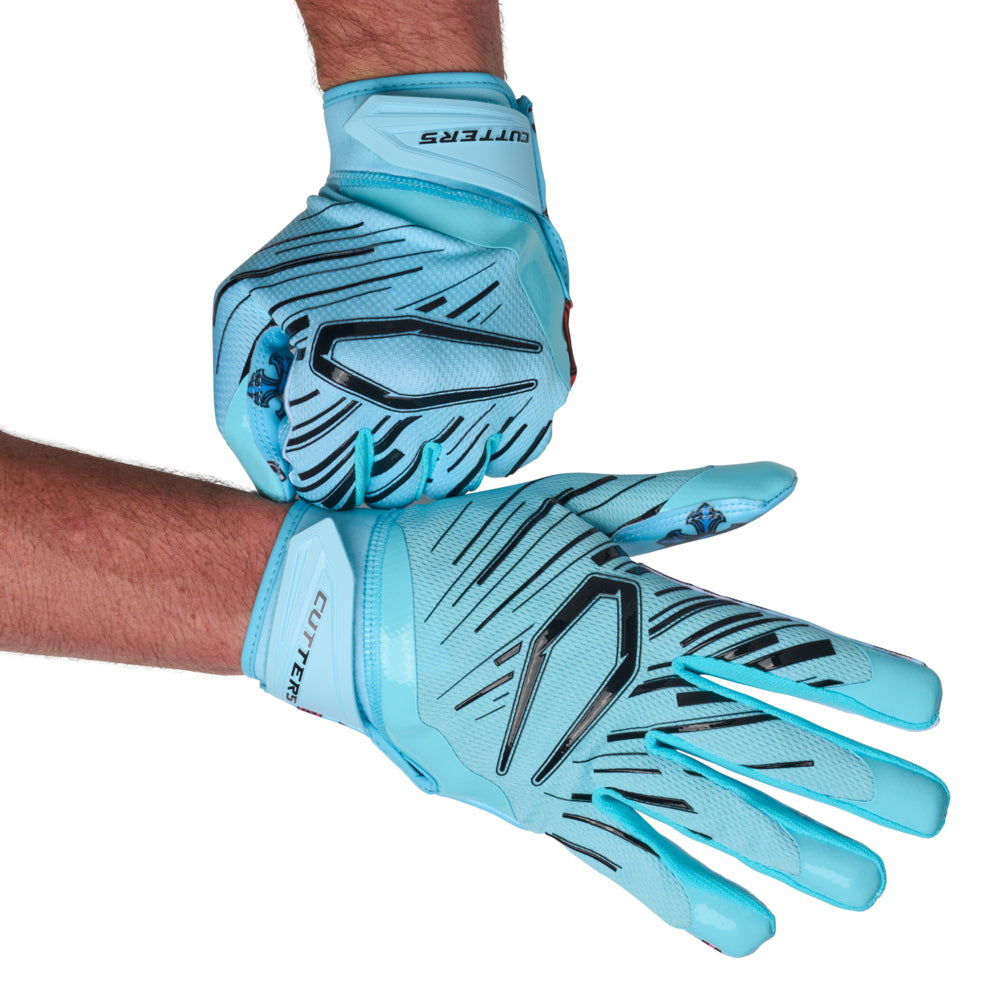 Cutters Divine Drip Game Day Pro Limited-Edition Receiver Gloves pair shown flat, displaying multicolor cross pattern silicone palm grip alongside light blue backhand with black C-shield logo
