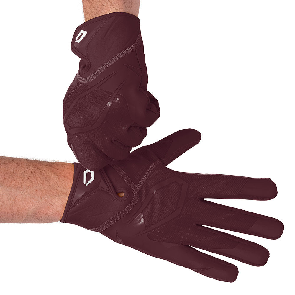 Player wearing Maroon Cutters Rev Pro 7.0 football receiver gloves, hands crossed at the wrists