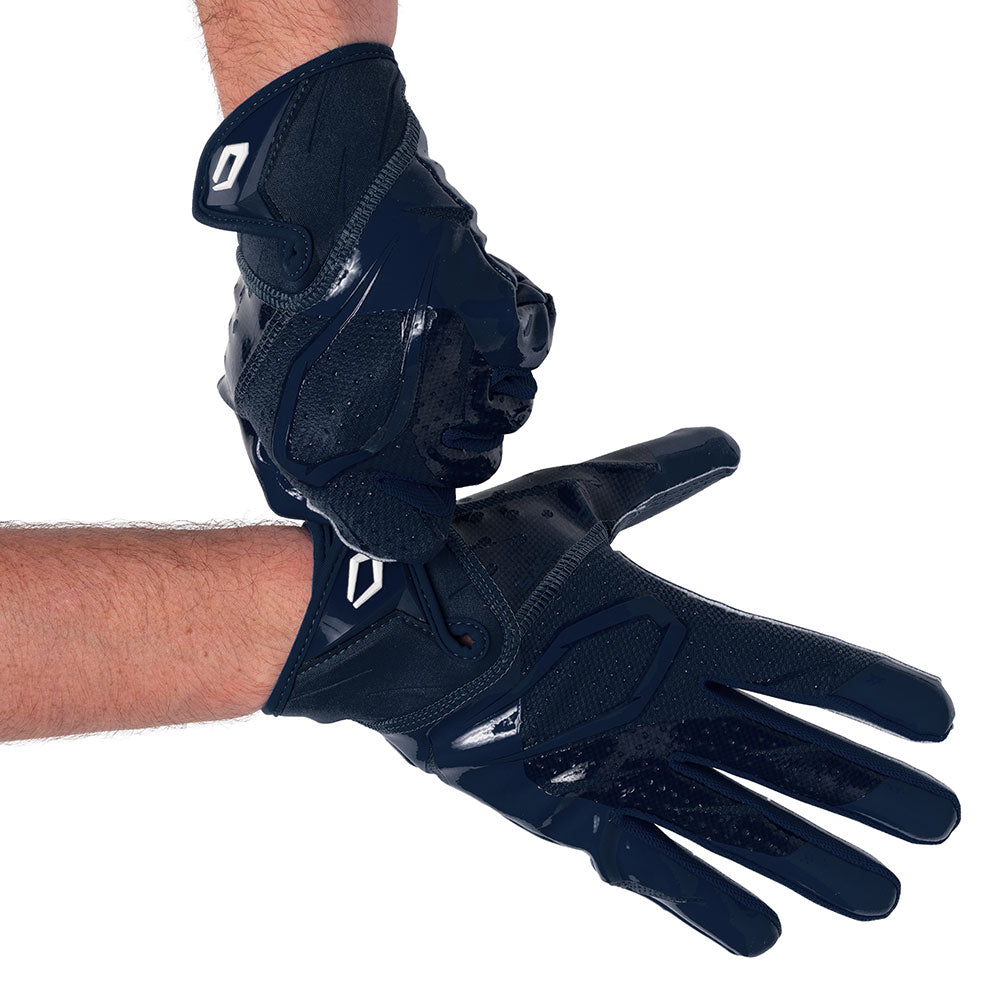 Player wearing Navy Cutters Rev Pro 7.0 football receiver gloves, hands crossed at the wrists