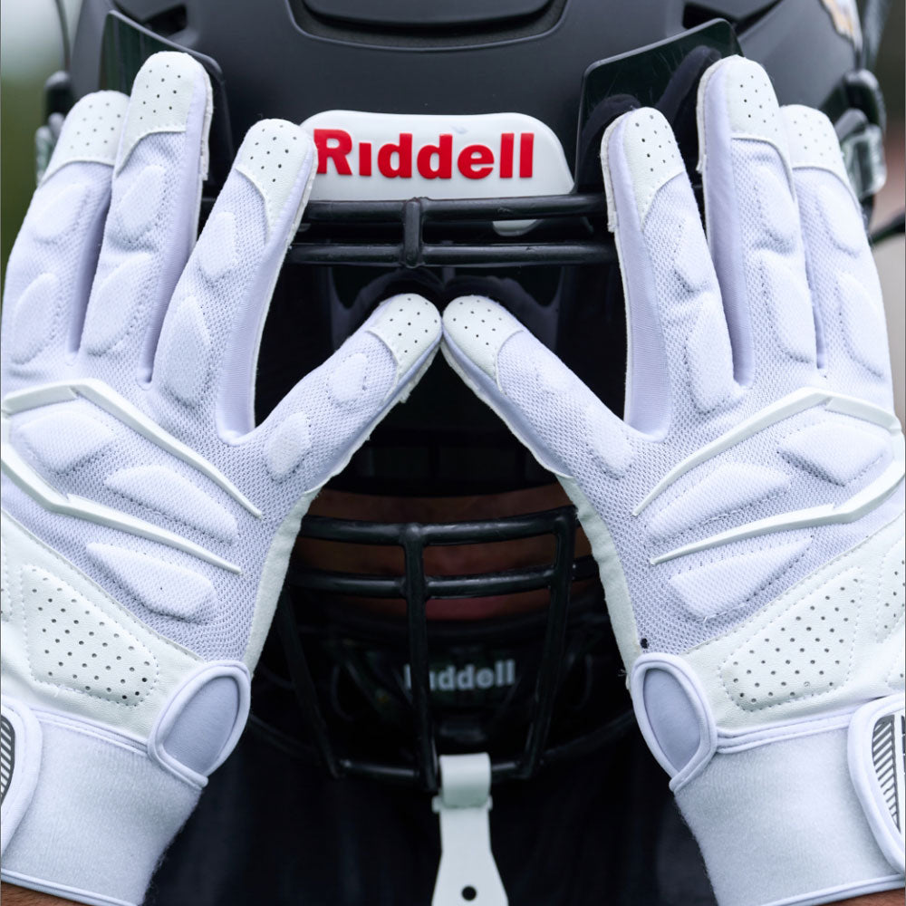 Lifestyle Image of Youth Football Player Wearing Force 5.0 Lineman Gloves in White