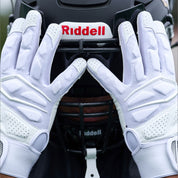 Lifestyle Image of Youth Football Player Wearing Force 5.0 Lineman Gloves in White
