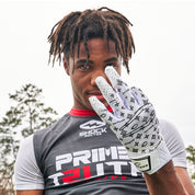 Youth 7v7 Football Player Wearing Cutters White/Black Lux Rev Pro 5.0 Limited-Edition Receiver Gloves