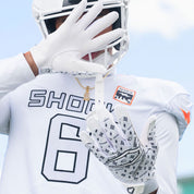 Athlete Wearing Cutters Rev Pro 6.0 Limited Edition Football Receiver Gloves in White/Black Lux Print