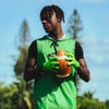 Youth 7v7 Football Athlete Wearing Cutters Sports Rev Pro 6.0 Solid Receiver Football Gloves in Shock Green